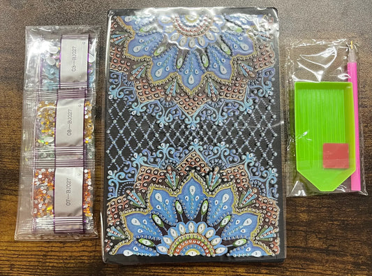 Cahier de diamond painting mandala bleu clair avec motifs floraux en points
