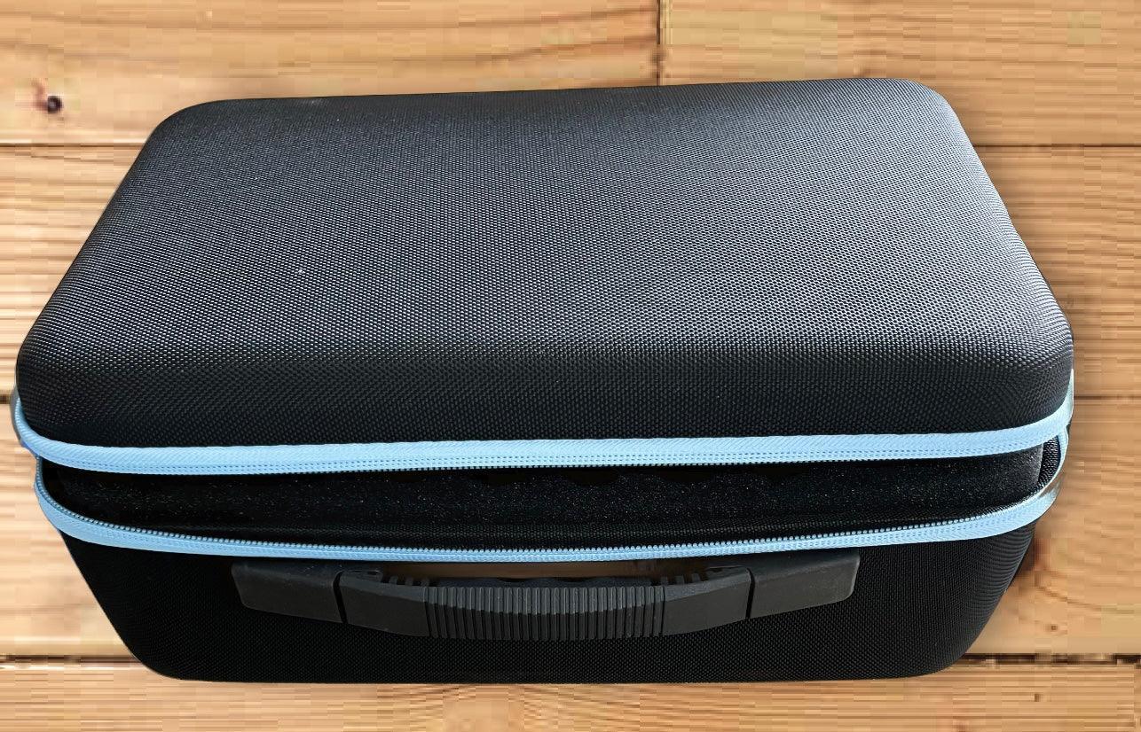 Valise de rangement fermée en tissu noir, fermeture éclair, liseré bleu